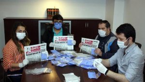 Yerel gazete abonelerine ücretsiz maske dağıttı