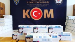 Konya'da, tekstil firmasına yapılan baskında izinsiz üretilen 68 bin adet 'cerrahi maske' ele geçirildi