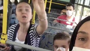 Maske takmayan kadın kendini uyaranlara saldırdı 