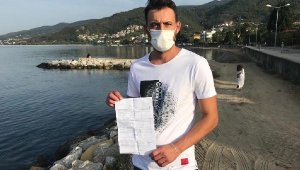 'Denizde yüzerken maske takmama cezası kesildi' iddiası